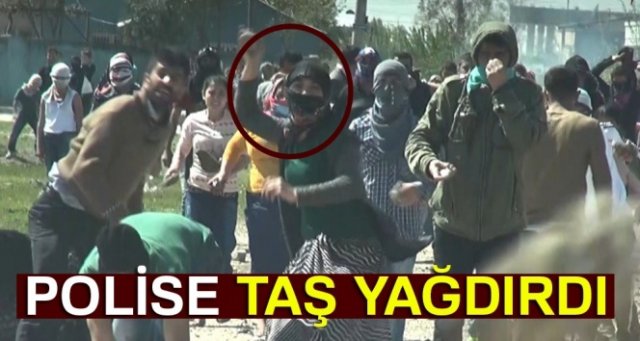 Erkeklerle birlikte polise taş yağdırdı, ev hapsi cezası aldı