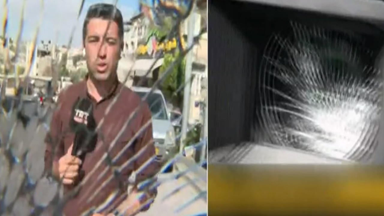 İsrail Polisi TRT Haber ekibine saldırdı! Dipçikle kamerayı kırdılar